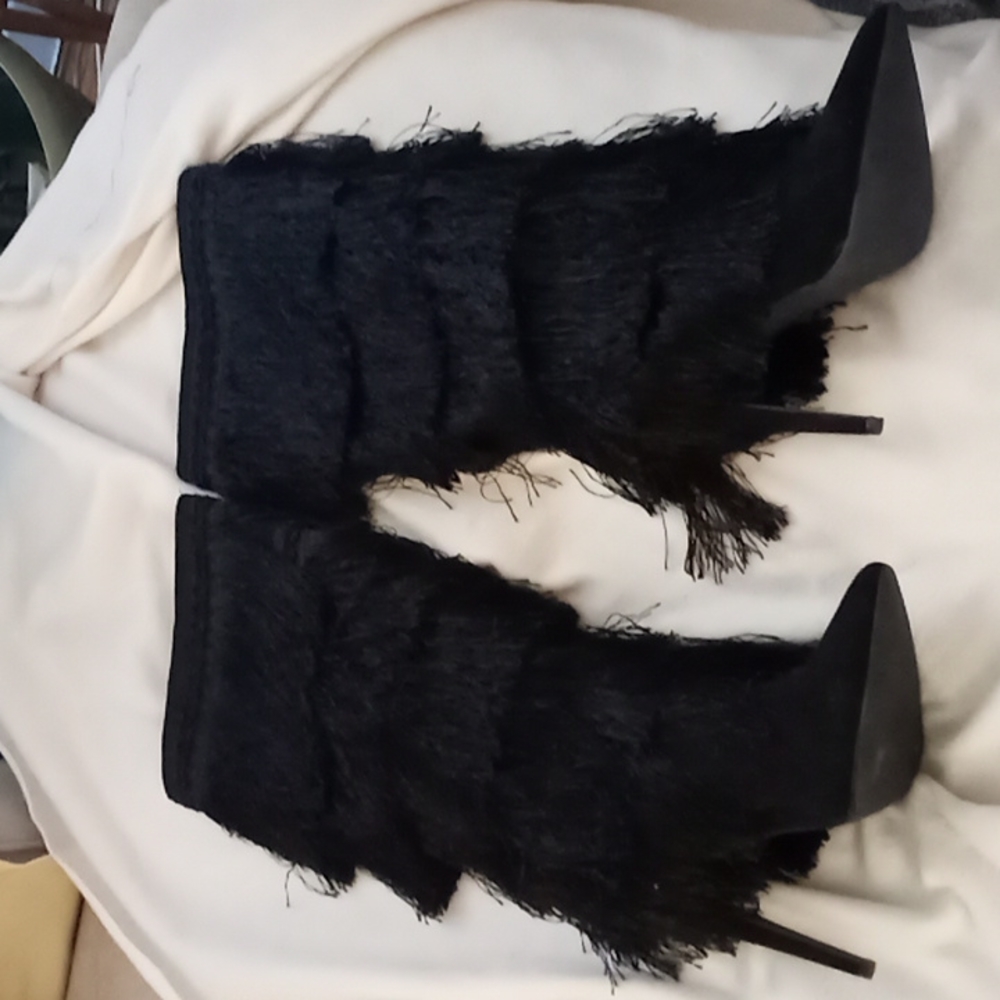 Knee high black fringe boots